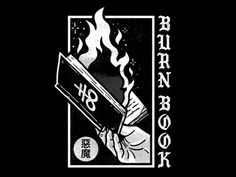 a black and white image of a burning book