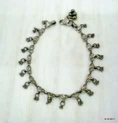 VINTAGE ANTIQUE HANDMADE TRIBAL OLD SILVER FLEXIBLE CHAIN ANKLET (SANKALI OR PAIZEB) FROM RAJASTHAN INDIA. GREAT TO WEAR FOR BELLY DANCE AND FOR OLD TRIBAL JEWELLERY COLLCTION.Length - 28 cm(11") we can adjust the length.width include bells - 1.6 cm(0.63") weight - 23.5 gramsmaterial- silver and original old worn piece. Bohemian Oxidized Adjustable Anklets, Bohemian Oxidized Anklets With Adjustable Fit, Bohemian Oxidized Finish Adjustable Anklets, Handmade Silver Metal Anklets, Traditional Metal Anklets As Gift, Traditional Metal Anklets For Gift, Silver Bohemian Anklets For Festivals, Bohemian Silver Anklets For Festivals, Bohemian Style Oxidized Finish Anklets As A Gift