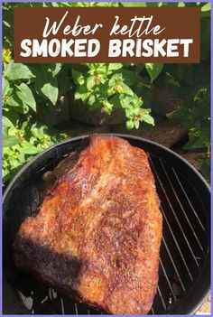 there is a steak on the grill with text overlay that reads weber kettle smoked brisket