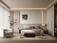 a bedroom with a large bed and white furniture