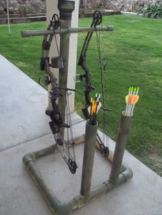 an outdoor archery set with arrows and bows