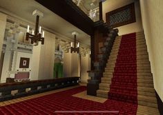 a large room with red carpet and stairs