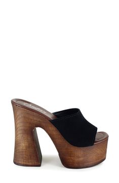 A woodgrain platform and soaring block heel lend scene-stealing height and retro-cool appeal to a slide sandal that will elevate your trendsetting looks. 4" heel; 2" platform Leather upper and lining/synthetic sole Made in Spain 70s Fashion Shoes, 70s Heels, 70s Platform Shoes, Platform Sandals Outfit, Brown Platform Sandals, Hippie Shoes, Wood Heels, Strappy Platform Sandals, Funky Shoes