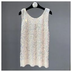 45056124649689 White Tank Top For Party, White Vest Top For Party, White Party Vest Top, Summer Party Sleeveless Tank Top, Stretch Sequined Tank Top, Summer Party Tank Vest, White Sleeveless Party Top, Glamorous Sleeveless Vest Top, Summer Party Shimmer Tank Top