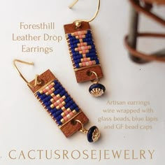 Foresthill earrings  Distressed brown leather wrapped in navy blue, gold, pink and white Japanese glass cylinder beads using a non-tarnish gold tone wire. Two Lapis Lazuli rondelles cradled within gold filled beads caps sway below. Gift box included for gift giving or let's be honest... Wrap them up and give them to yourself! Details Handmade item Ships from a small business in California Length: 52 Millimeters; Width: 10 Millimeters Materials: Glass, Leather, Stone Gemstone: Lapis lazuli Locati Leather Earrings Ideas, California Jewelry, Leather Jewelry Making, Fabric Jewellery, Leather Jewellery, Diy Weaving, Beading Jewelery, Glass Cylinder, Seed Bead Patterns