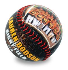 a close up of a baseball on a white background with an orange and black design