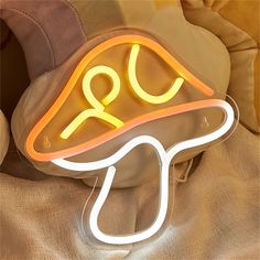 a neon sign that says go with it on the back of a car headrest