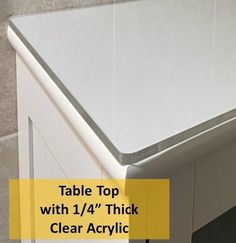 a table top with 1 / 4 thick clear acrylic covering on it and the words, table top with 1 / 4 thick clear acrylic