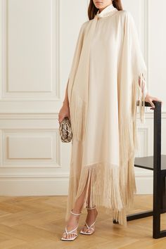 Taller Marmo's 'Mrs. Ross' kaftan is inspired by gowns worn by the glamorous diva herself, Diana. Cut from crepe that drapes beautifully, it has a satin tie-detailed high neck and wide sleeves, and a waterfall hem accented with sweeping fringe. Taller Marmo, Kaftan Designs, Mode Abaya, فستان سهرة, Maxi Robes, Dress Cotton, Abayas Fashion, Abaya Fashion, Kaftan Dress