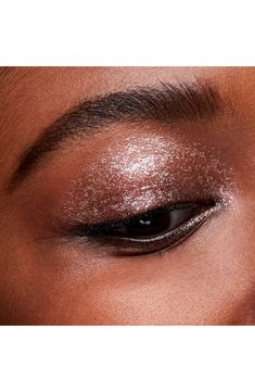 What it is: An ultra-shiny liquid eyeshadow that glides across lids for a wash of brilliant color and keeps its splendor for up to eight hours.What it does: Get lost in eyes that tantalize, mesmerize and glamorize. This cooling formula sets quickly for the ultimate second-skin texture that feels ultrasoft on your lids. The long-wearing formula lasts for up to eight hours and provides even color payoff while delivering stay-true color and a silky-smooth texture. It adheres to your lids with one s Mac Dazzleshadow Liquid, Mac Dazzleshadow, Eyeliner Stickers, Eyeliner Designs, Apply Eyeshadow, How To Apply Eyeshadow, Liquid Eyeshadow, Not Afraid, Smooth Texture