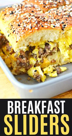 this breakfast slider is loaded with eggs, cheese and other toppings it's ready to be eaten