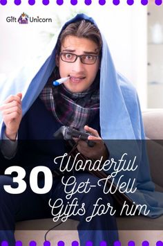 a man with glasses and a blue blanket on his head is holding a toothbrush