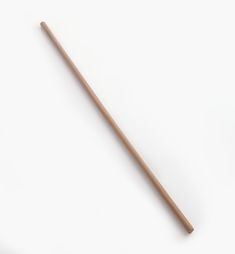 a wooden stick on a white background