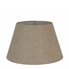 a beige lamp shade on a white background with the bottom half turned down to show the fabric