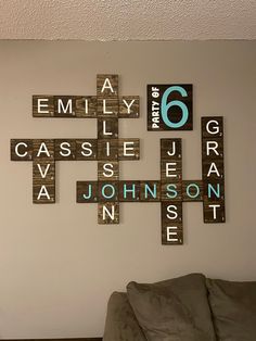 a living room filled with furniture and scrabble tiles