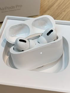 an airpods pro is sitting in a box