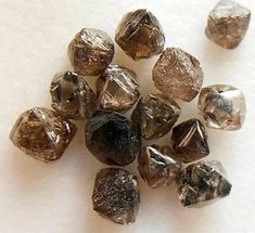 PLEASE SELECT YOUR DESIRED WEIGHT/SIZE/QUANTITY/LENGTH FROM THE DROP DOWN MENU WHILE MAKING YOUR PURCHASE. This listing is for 3-4mm Brown Raw Diamond Crystal, Natural Rough Diamond, Uncut Diamond, Loose Diamond Crystal, Diamond Octahedron For Jewelry (1Pc To 5Pc) Gemstone : Rough African Diamond (CONFLICT FREE) Color : Sparkling Brown Size - 3-4mm Item Code: DDP35 (Measurements and weight are close to approximations.) 100% Genuine Great quality for making Necklace , Earrings, Bracelet or any ot Geode Rocks, Gemstone Beads Wholesale, Jewelry Education, Coin Collection, Crystal Diamond, Tiny Diamond, Green Diamond