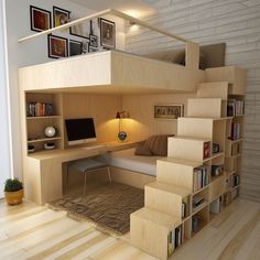 there is a loft bed with stairs to the top and desk below in this room