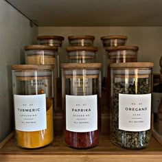 jars filled with different types of spices on a shelf