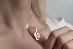 Treble Clef Necklace 925 Sterling Silver, Music Note Jewelry, Musician Gift, Music Student Gift, Graduation Gift For Singer, Pianist Pendant TO OUR VALUED CUSTOMERS ! Please take a look at our special catalog that we have prepared for you ! ▶ https://www.etsy.com/shop/MarryMinimalist ✔️ All products in our unique store are personalized. ( You can find our font list in the images ) D E T A I L S ✔️A lifetime silver CLEANING CLOTH is given as a GIFT along with the 925 Sterling Silver Necklace! ✔️ * Made to Order. * Handmade with Sterling %100 925K Sterling Solid Silver. * Choice of Gold Color: Gold, Rose Gold, Silver * Length: 14", 16", 18", 20", 22" * Ready to Ship in 1-3 Business Days * Free returns within 14 days from the order date. ✔️ 24/7 Friendly Customer Service, contact us for any q Music Student Gifts, Music Note Jewelry, Treble Clef Necklace, Silver Cleaning, Music Student, Musician Gifts, Treble Clef, Student Gift, Gift Graduation