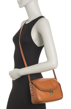 The perfect-sized miniature crossbody bag, crafted in supple leather with signature logo. . Single adjustable strap. Foldover flap with zip top closure. Approx. 7?H x 9.5?W x 3.5?D . Imported Leather exterior, textile lining Mini Messenger Bag, Small Messenger Bag, Signature Logo, Leather Mini, Zip Top, Nordstrom Rack, Marc Jacobs, Messenger Bag, Clothing And Shoes