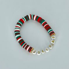 This is the perfect festive Christmas themed bracelet. It’s so much fun and can be worn alone or stacked with many other options Bracelets are “one size fits most” and are designed to fit wrists up to 7.0”. Custom sizes available upon request. Please email designsby.kb@yahoo.com once your oder is placed. *Bracelets usually ship within 3-5 business days. Xmas Bracelets, Christmas Jewelry Diy, Gold Bar Bracelet, Single Bracelet, You Name It, Bead Bar