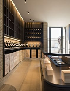 an empty wine cellar with lots of bottles