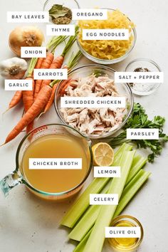 the ingredients for chicken broth laid out on a white surface with text overlay