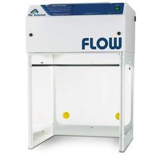 the flow machine is white and has yellow buttons on it's front door,