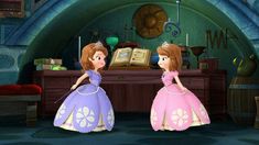 two animated princesses standing in front of a desk