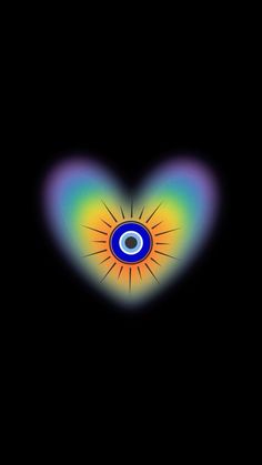 an eyeball in the shape of a heart on a black background with rainbow colors