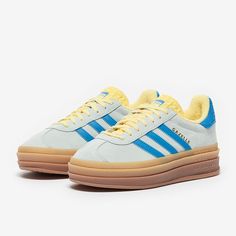 The 70s return in signature style with the adidas Originals Womens Gazelle Bold in Almost BlueBright BlueAlmost Yellow, featuring premium suede and signature detail that shows off in smooth style. The adidas Originals Womens Gazelle Bold is firmly rooted in the adidas archives, elevating a design from the 7039s with new colours and details on smooth, premium suede.  These will slide neatly into your wardrobe whatever your regular getup looks like.Gazelle lettering on the side adds that true auth Fitness Fashion Active Wear, Adidas Gazelles, Yellow Trainers, Gazelle Shoes, Yellow Adidas