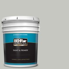 the behr paint company's primer in one is shown on a beige background