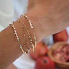 A classic twist of dainty and statement. Our half cuff & chain bracelet is a specialty, each cuff adorned with your favorite precious stones. Material: 10 gauge, 14/20 gold filled half cuff, curb gold filled chain Size: 6 1/4" (standard women's wrist size, second link for adjusting smaller) Stone: Choose between our natural & graded, Sapphire, Ruby & Emerald. Setting: 14kt Gold Processing time is 1-2 week from the time the order is placed! Dainty Gold Jewelry, Dope Jewelry, Gold Bracelet Cuff, Jewelry Lookbook, Bijoux Diy, Jewelry Inspo, Dream Jewelry, Stylish Jewelry, Gold Filled Chain