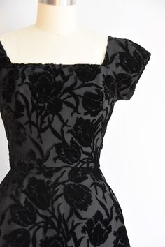 "Stunning vintage 1950s cocktail dress. Flock velvet in floral motif. Square collar and v back. Capped sleeves, darted bust and nipped waist. Semi full skirt with crinoline underneath. Back metal zip closure. State of garment | very good, light overall wear with one small discoloration mark on back of skirt. request additional photos if needed. Measurements ✂--- Best fit | Small Bust | 34\" Shoulders | not specified Shoulder to waist | shy of 15\" Sleeves | 5\" Waist | 25\" Hips | up to 38\" Tot 1950s Satin Dress, Velvet Flower Dress, Vintage Velvet Dress With Fitted Bodice, Cocktail Dress Floral, Vintage Cocktail Dresses, 1950 Dress, 1950s Cocktail Dress, Vintage Cocktail Dress, Happy Dresses