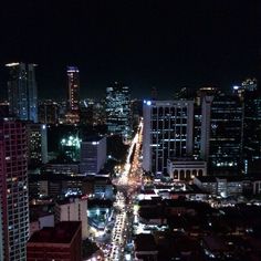 an aerial view of a city at night