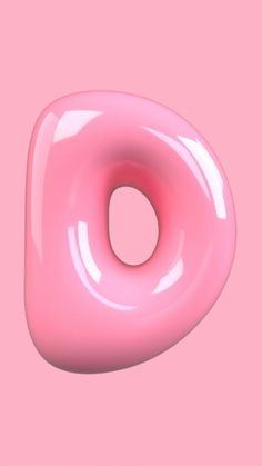 a pink donut on a pink background