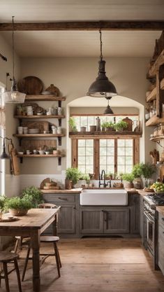 a kitchen with wooden floors and open shelves