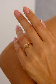 "14K Gold Heart Ring, Open Heart Ring, Dainty Gold Band Ring, Love Heart Ring, Promise Ring, Minimalist ring, Heart Gold Ring, Best Friend Ring Features *Material: 14K Real Gold *Color Options: Yellow Gold, White Gold, Rose Gold *Metal Stamp: 14K (585) *Available Ring Sizes: 3US to 10US Size *Weight(approx) : 1.50 grams *Ready to Ship in 3-5 Business Days. FREE Express worldwide shipping. FREE Engraving service Each item is made to order. Comes in a Gift Box with 14K Gold Certificate. This produ Small Rings Simple Gold, Ring Designs Heart Shape, Rings Aesthetic Heart, Heart Gold Ring Design, Gold Heart Ring Simple, Cute Small Rings, Simple Dainty Rings, Gold Ring Heart, Dainty Promise Rings Simple