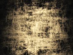 an old grungy textured background in black and gold colors with white highlights