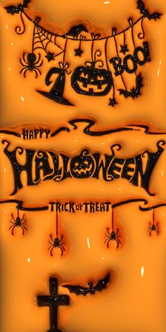 an orange background with black lettering on it and halloween decorations hanging from the ceiling above