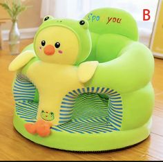 a green chair with a yellow bird on it's back and the words, stop you