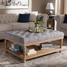 a living room filled with furniture and a coffee table