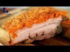 pork chops on a cutting board with crumbs and seasoning in the middle