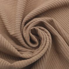 a close up view of a brown fabric