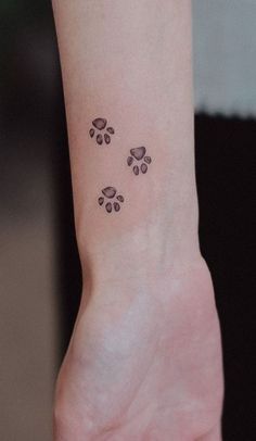 a small paw print on the wrist is shown in black ink, and it appears to be tiny