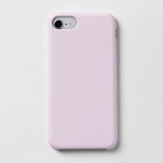 a pink iphone case sitting on top of a white surface