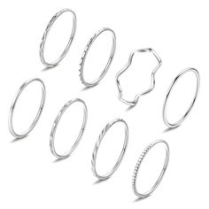 six different sizes of rings on a white background