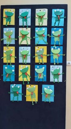 a bulletin board with pictures of frogs on it