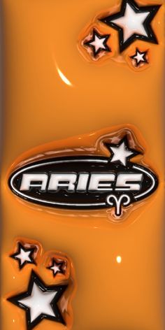 an orange car with black stars and the word aries on it